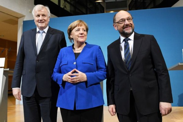 Merkel cède ses ministères au SPD pour former son gouvernement de coalition